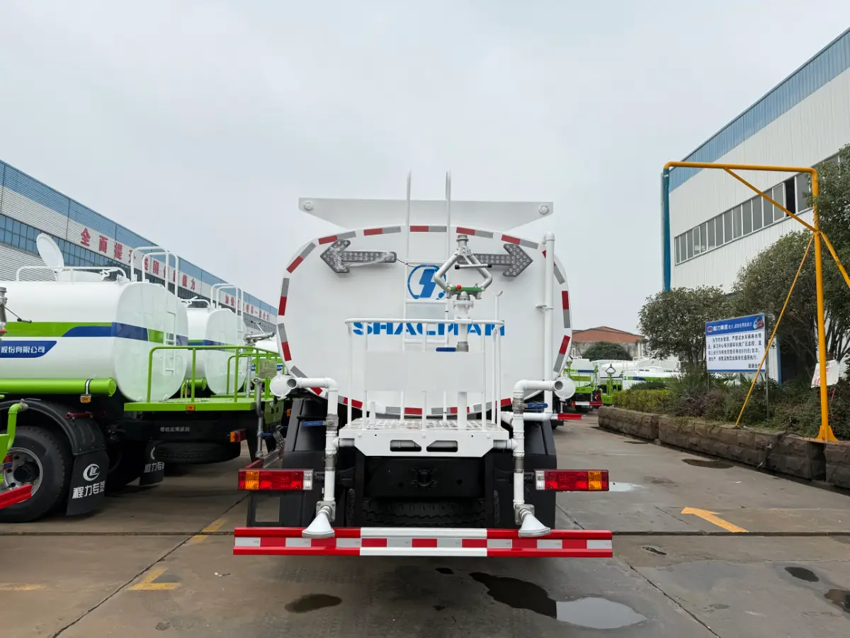 Rear of SHACMAN water tanker: rotating water cannon, LED arrow lights and duckbill spray nozzles